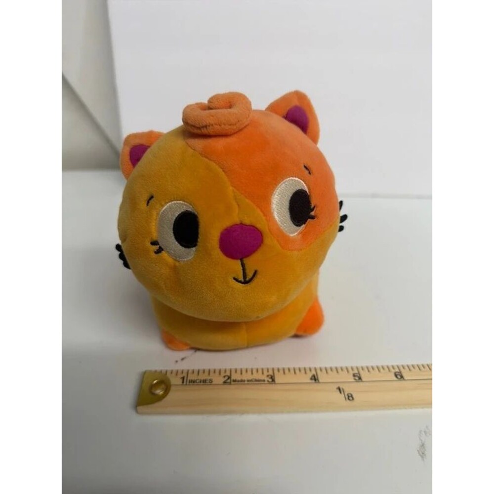 Animated cat plush that moves about and makes cute sounds.